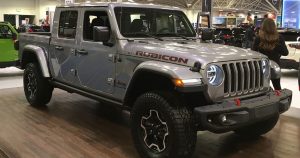 A grey 2020 Jeep Gladiator Rubicon on display at an auto show near Wichita, KS